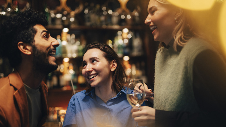 people talking in a pub