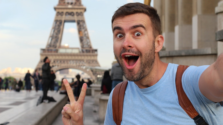 A man gestures enthusiastically