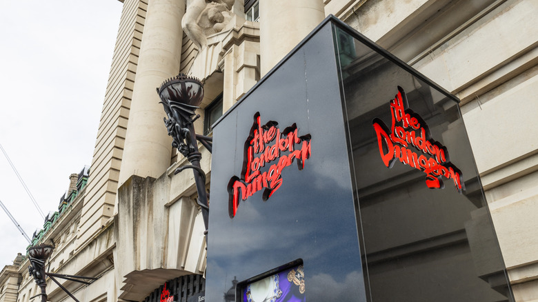 The London Dungeon entrance sign on County Hall facade