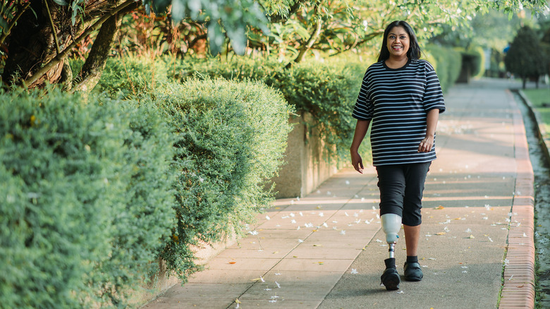 Woman walking and smiling