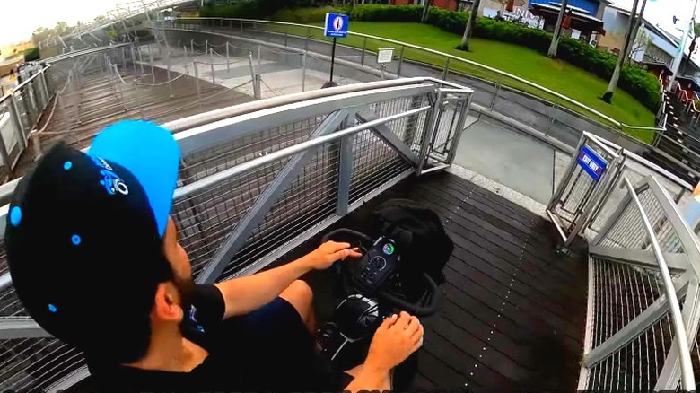 Guest riding ECV at Universal Orlando