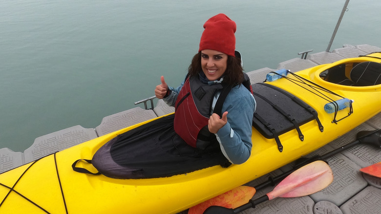 woman kayaking safety gear