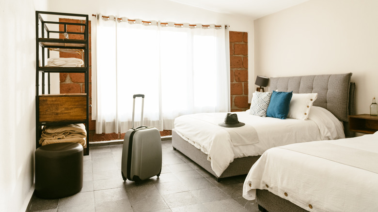 suitcases in hotel room
