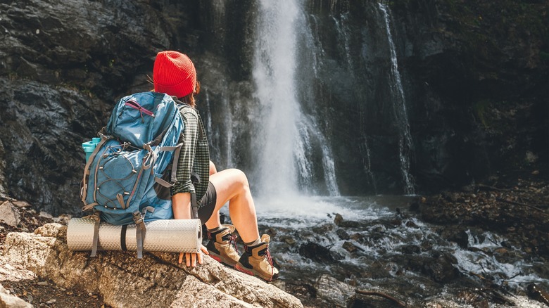 Hiker at a waterfall