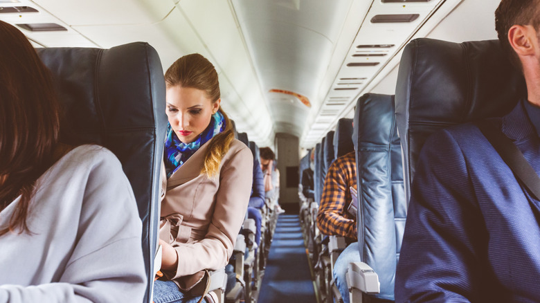 Passengers seated on plane