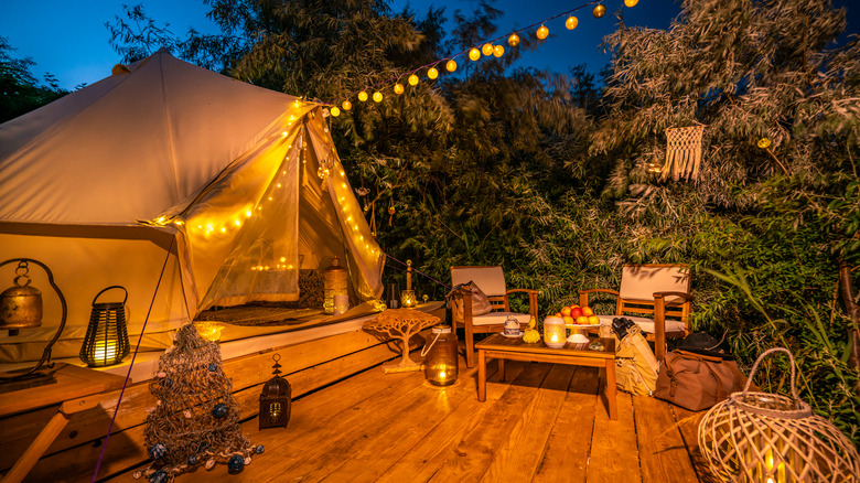Canvas glamping tent with porch