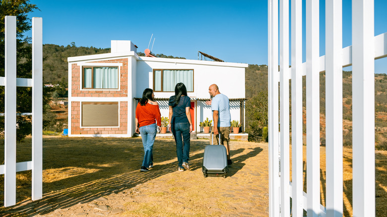 people entering Airbnb gate 