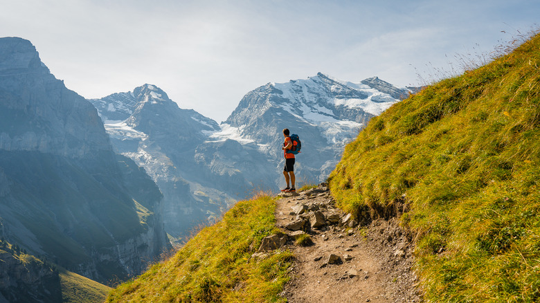 Man hiking near Oeschinen Lake