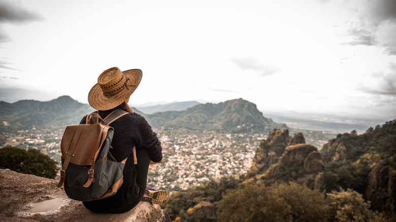 Solo traveler gazing at view