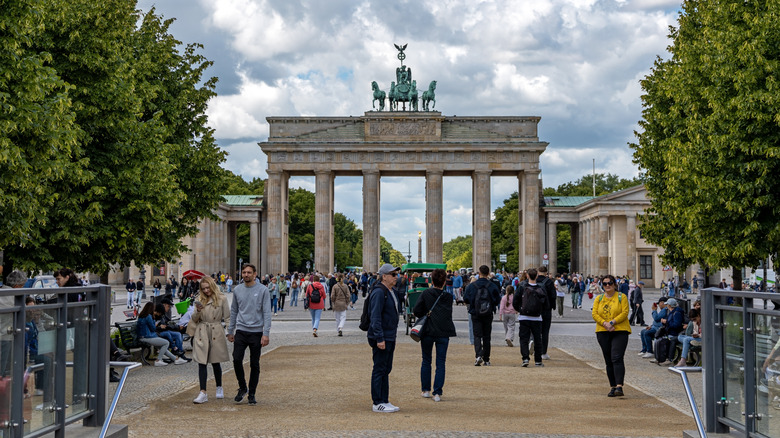 pedestrians around Brandenburg Gate in Berlin