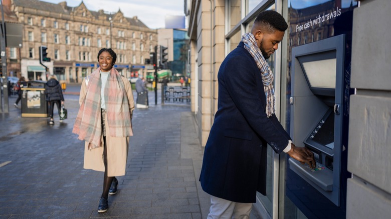 Man withdrawing money from an ATM