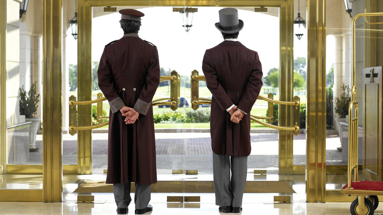 Doormen by a hotel lobby