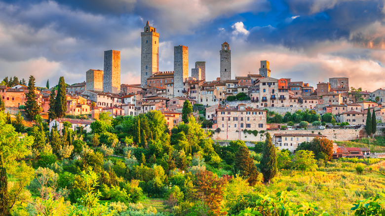 Medieval town skyline and landscape during sunrise.