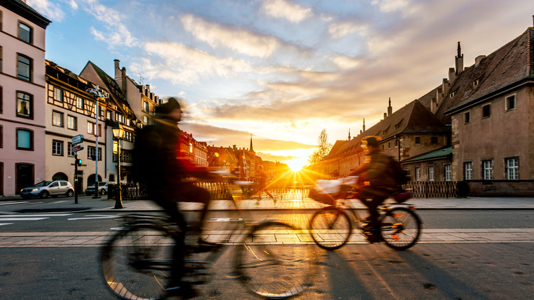 scene of sun rising in a European city