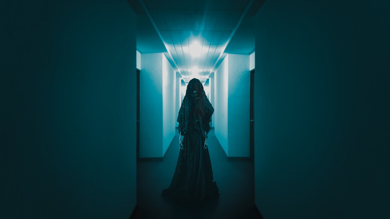 Ghost in blue hallway