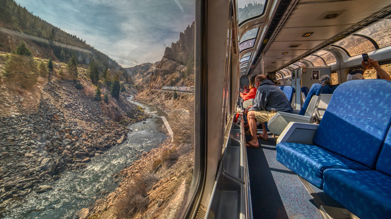 train passing through Rocky Mountains