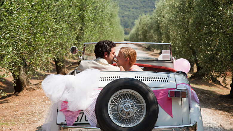 couple in car just married