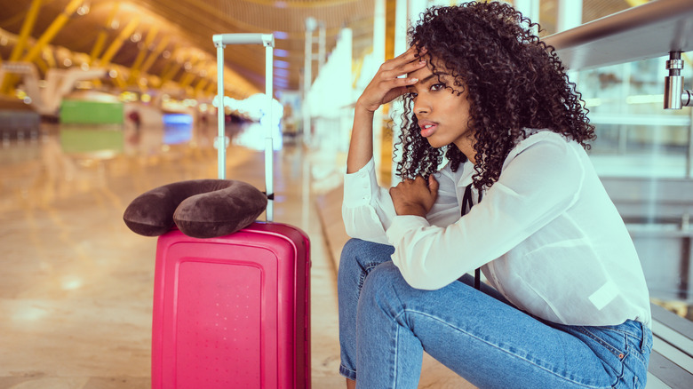 stressed woman at airport