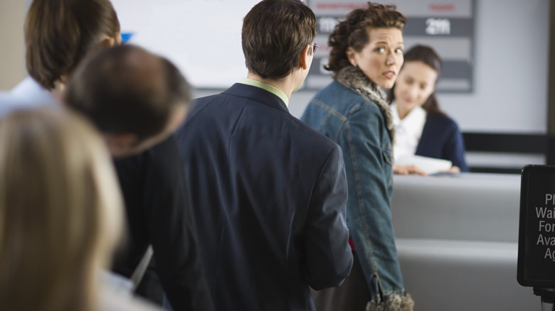 People in an airport line