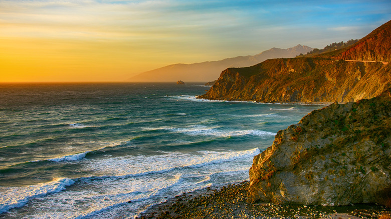 A secluded beach with cliffs