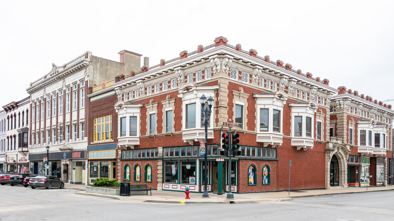a street corner with historic buildings with decorative facades