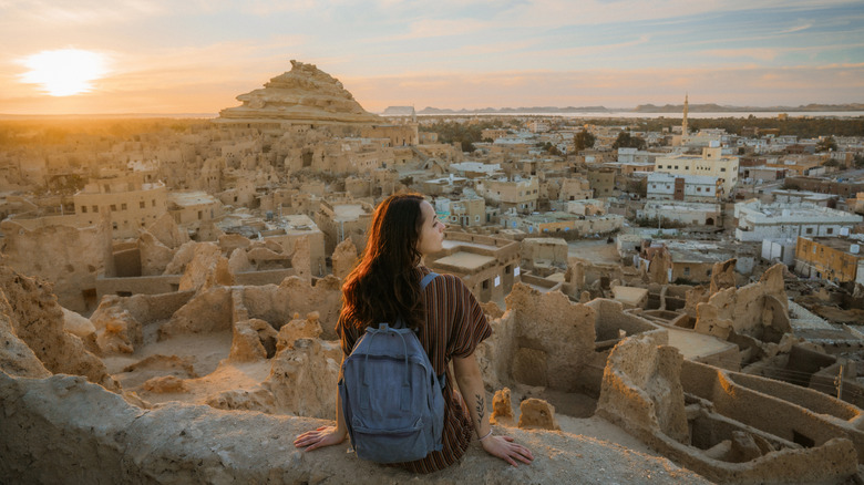 A woman looking at the view in Siwa Oasis, Egypt