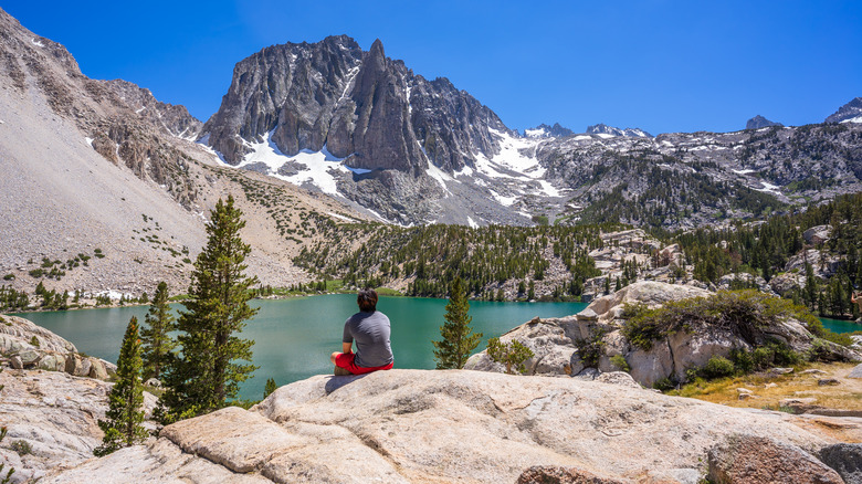 Person looking out at the mountains in Big Pine Lake