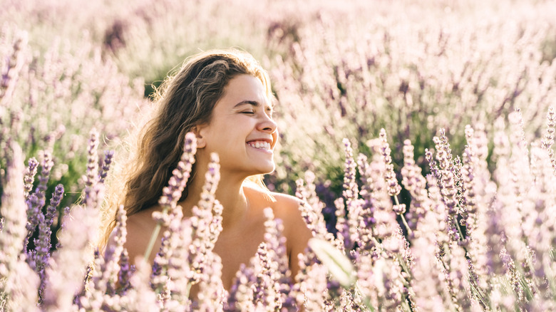 A woman in a flower field.