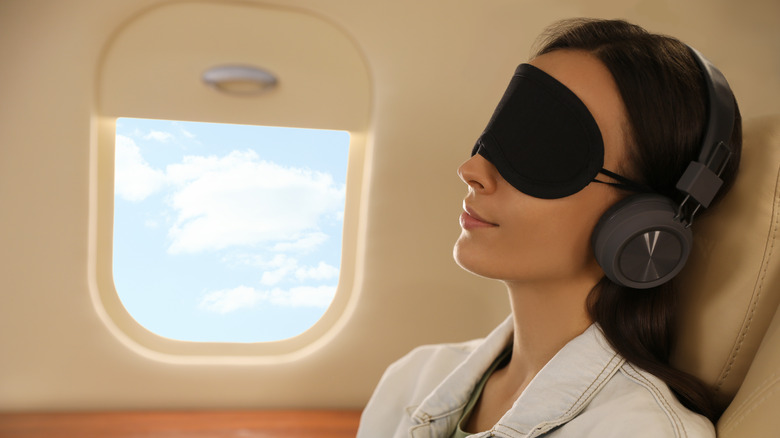 woman relaxing during flight