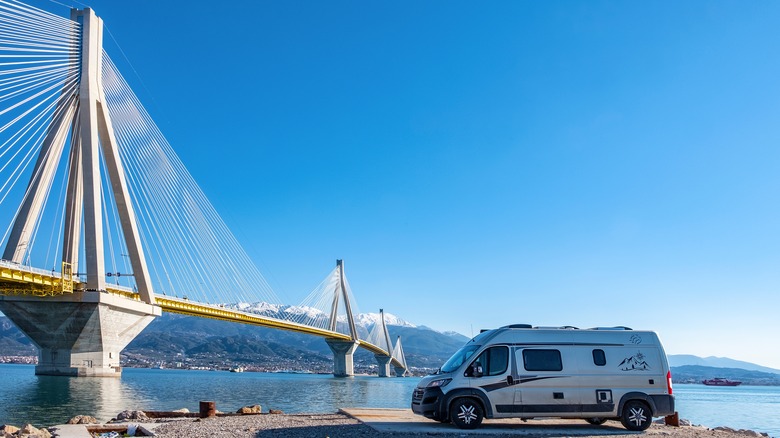 RV beside a bridge
