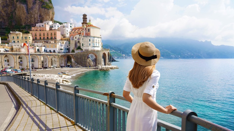 Woman overlooks Amalfi Coast landscape