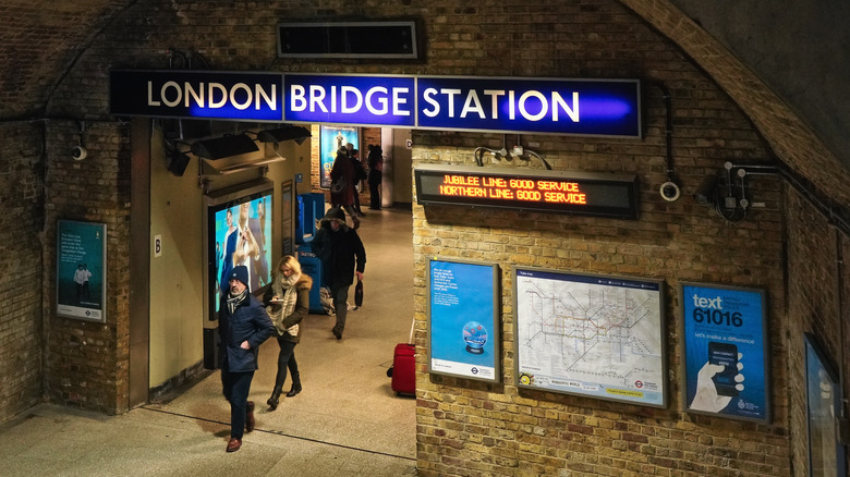 Passengers at Tube with map
