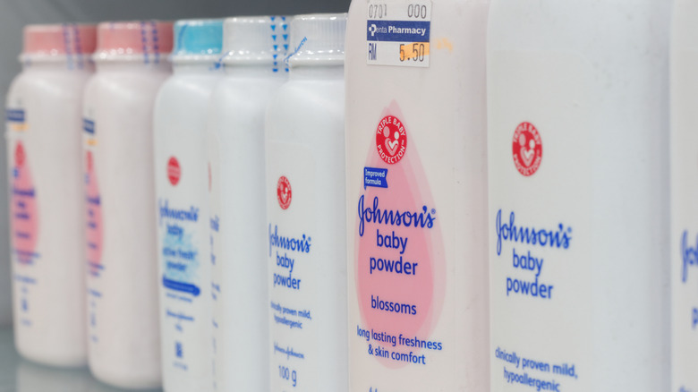 Bottles of baby powder on a shelf