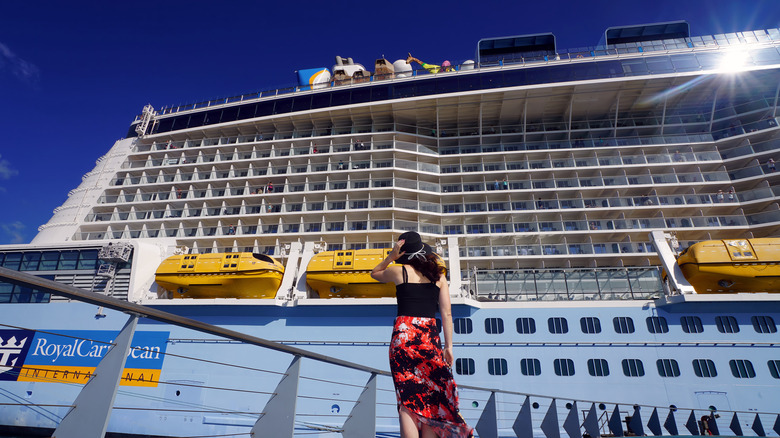 Woman looking at cruise ship