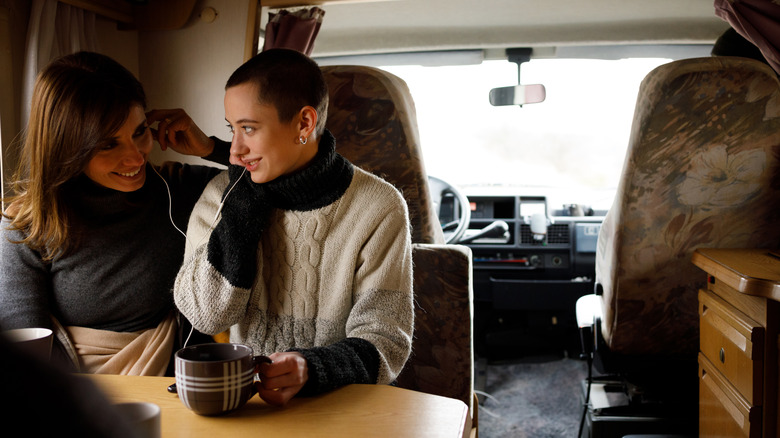 two women in an RV