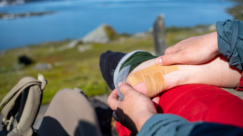 Hiker preventing blisters 