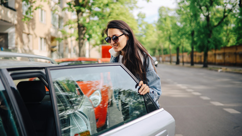 traveler getting in Uber