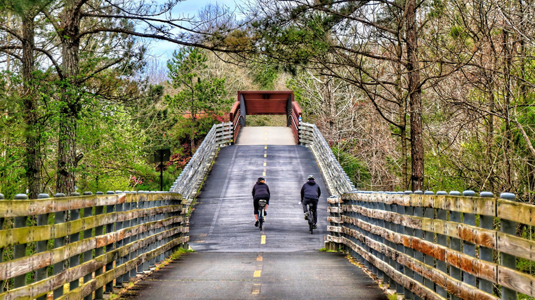 two cyclists crossing a bridge on the Silver Comet Trail in Georgia