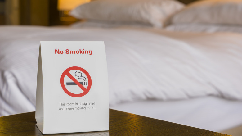 A "no smoking" sign in a hotel room