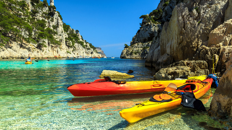 Kayaks parked on beach