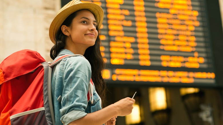Woman in train station