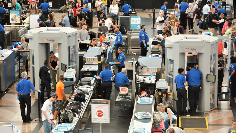 Passengers going through TSA lines