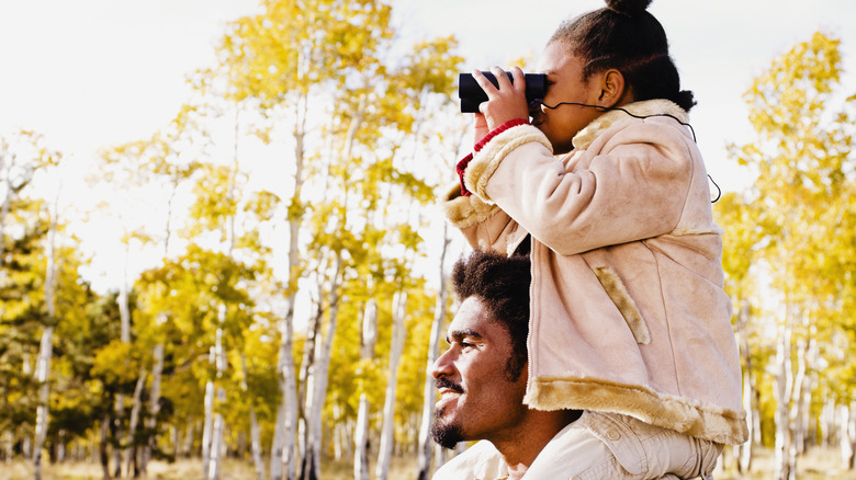 Father and daught birdwatching
