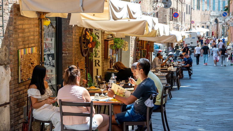 People dining outside in Florence, Italy