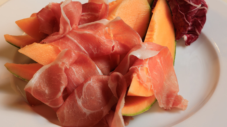 Prosciutto and cantaloupe on plate