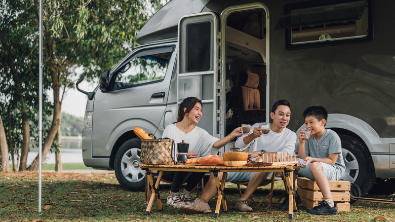 Happy family at an RV park