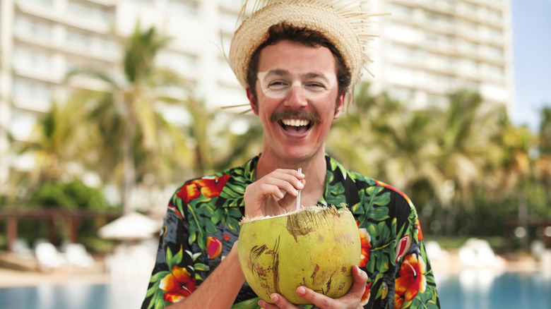 man laughing with funny sunburn