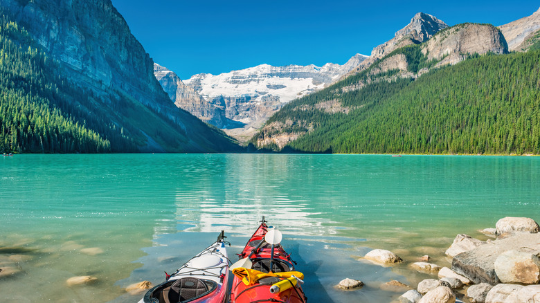 Kayaks overlooking Lake Louise in Banff National Park with a mountain backdrop