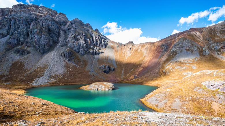 turquoise lake surrounded by mountains in Colorado