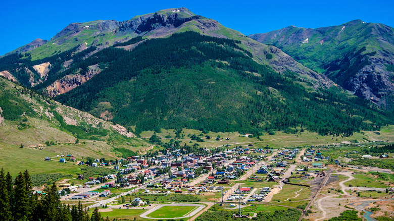 aerial view of Silverton Colorado surrounded by green mountains